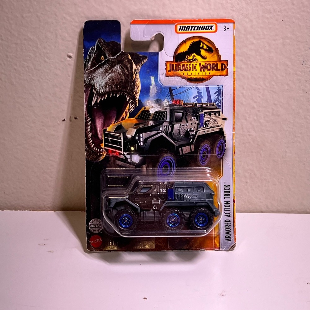 Matchbox Jurassic World Armored Action Truck Grey Blue Dominion Die-Cast HBH06
